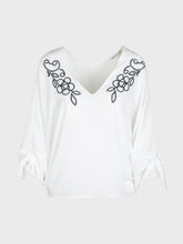 Blusa scollo v con ricamo e fiocchi maniche - BIANCO | Sandro Ferrone
